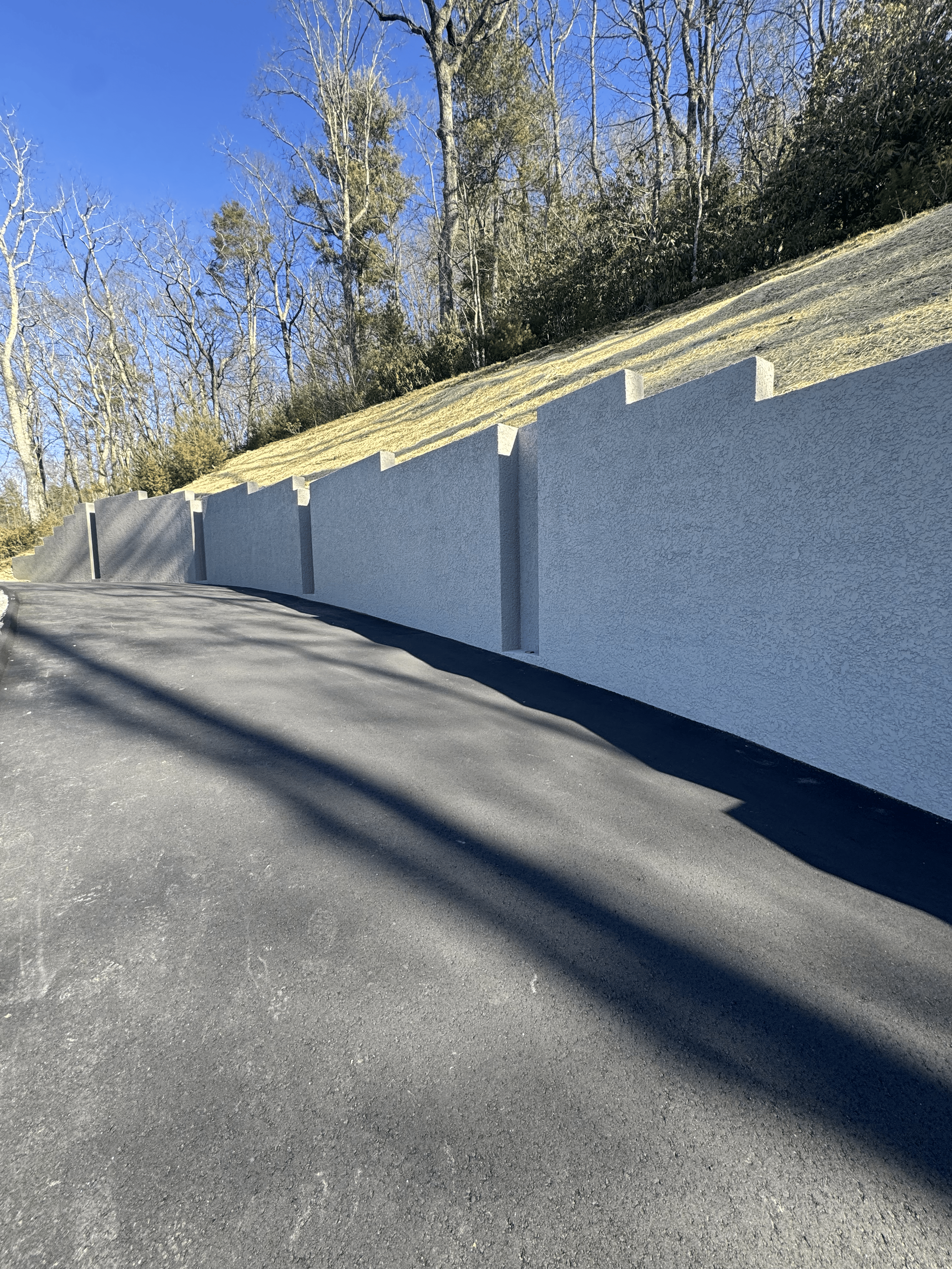 Laughter Family Hardscapes custom landscaping project - beautifully designed outdoor hardscape with natural elements