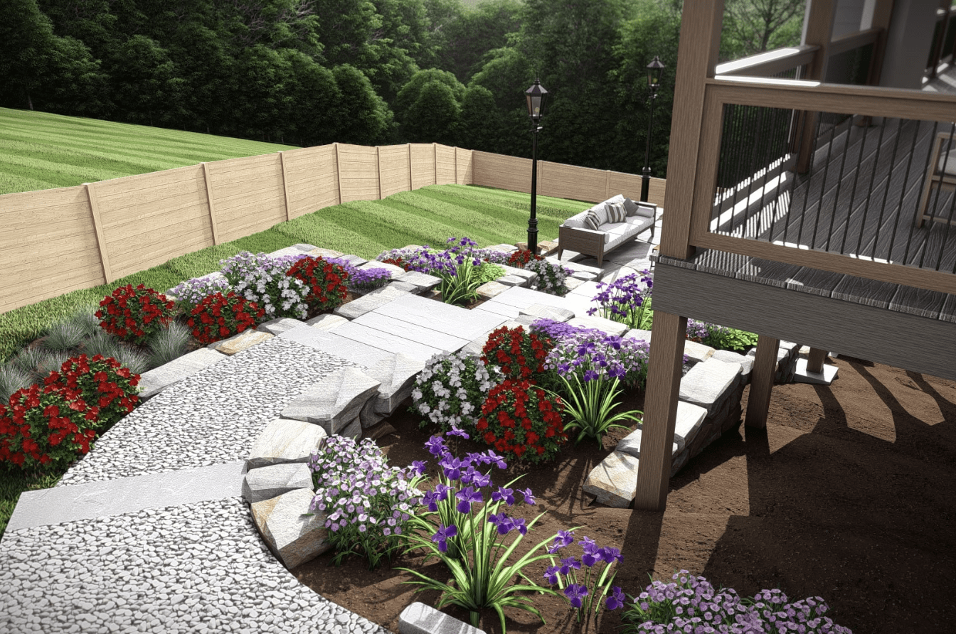Custom landscape design in Etowah, NC, featuring a vibrant pathway lined with colorful flowers, neatly arranged stones, and a cozy seating area under a wooden deck for outdoor relaxation.