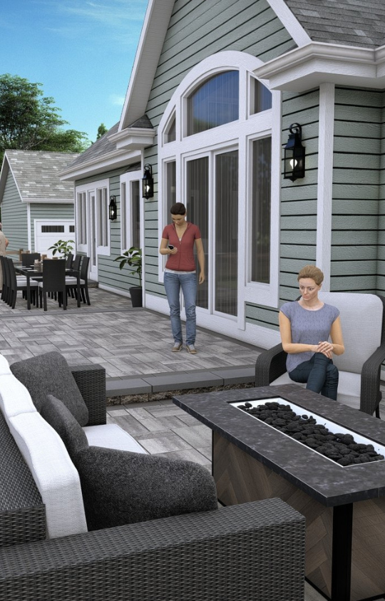 Beautifully crafted outdoor living space featuring a custom landscape design in Etowah, NC, with a spacious paver patio, stylish furniture, and a sleek gas fire pit, perfect for entertaining and relaxation.